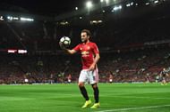 MANCHESTER, ENGLAND - AUGUST 19: Juan Mata of Manchester United gathers the ball during the Premier League match between Manchester United and Southampton at Old Trafford on August 19, 2016 in Manchester, England.  (Photo by Michael Regan/Getty Images)